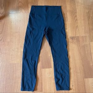Navy lululemon 7/8 crop leggings.